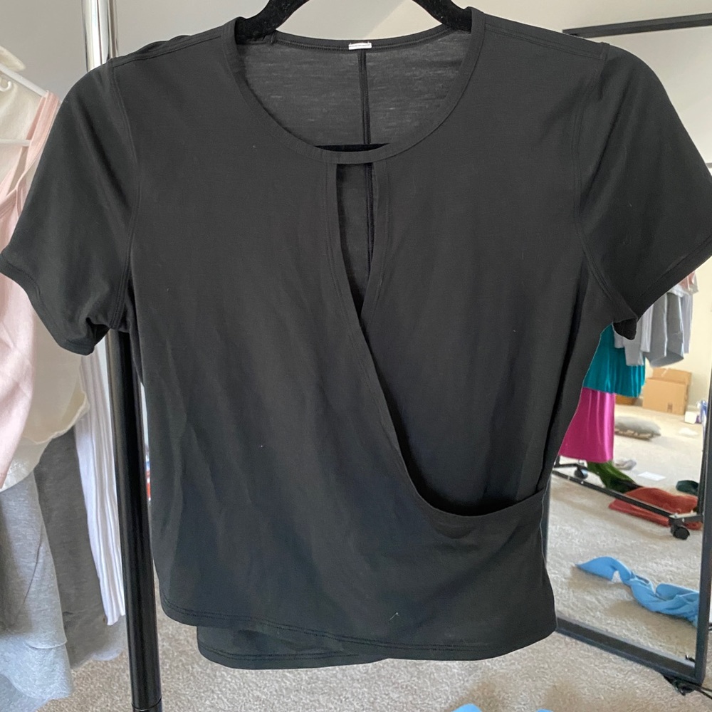 black lululemon open chest shirt